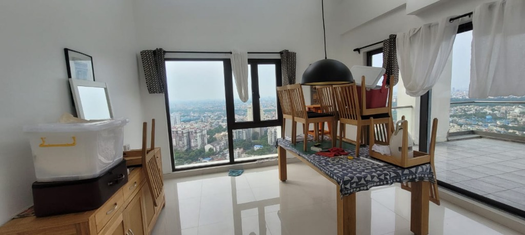 City view through wide floor-to-ceiling windows
