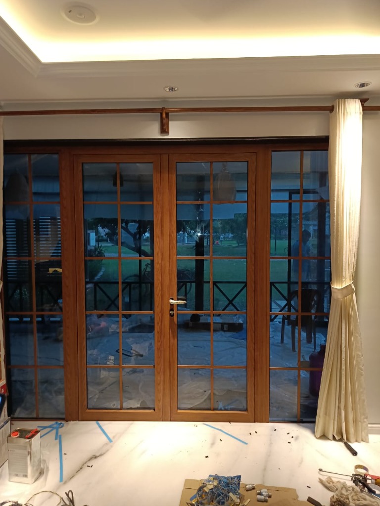 French-style glazed doors opening to a garden
