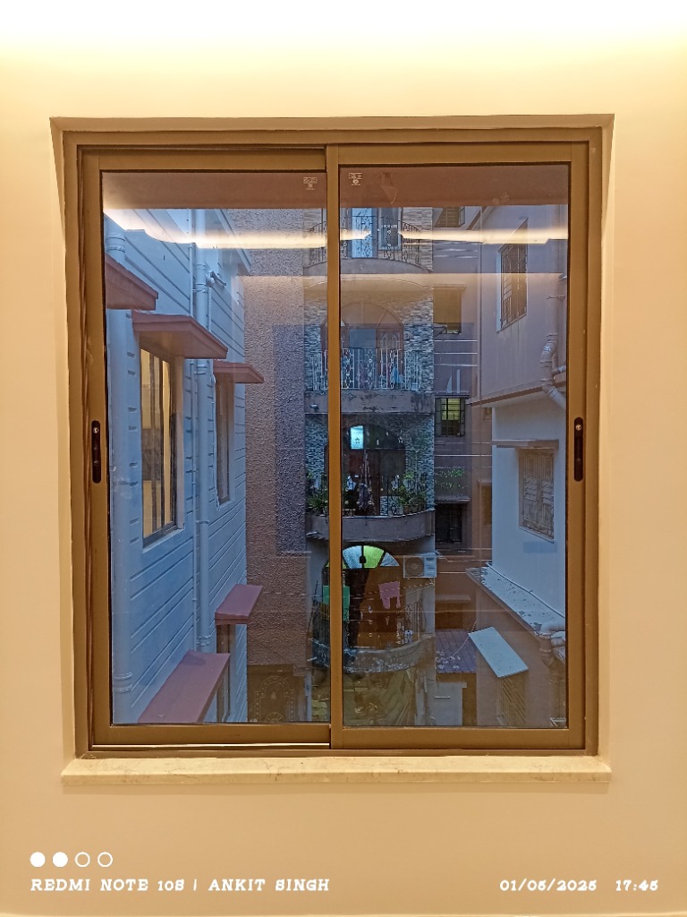 Champagne-finish aluminium sliding window